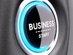 Blue Push button with the phrase business start. Concept image to illustrate new business