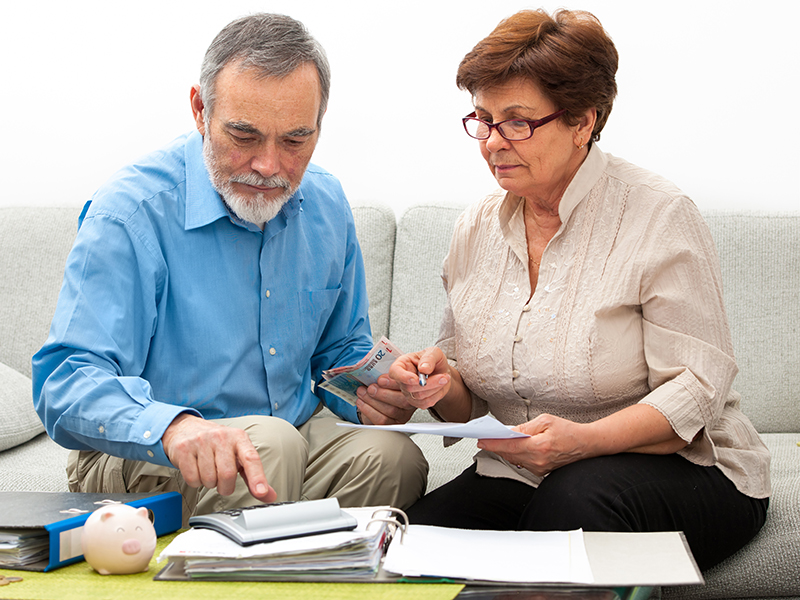 senior couple worrying about their money situation