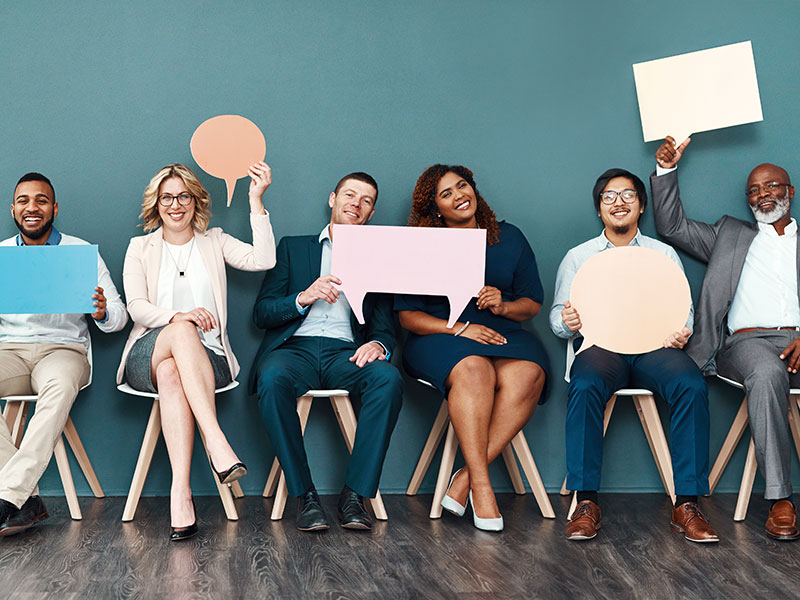 People holding speech bubbles