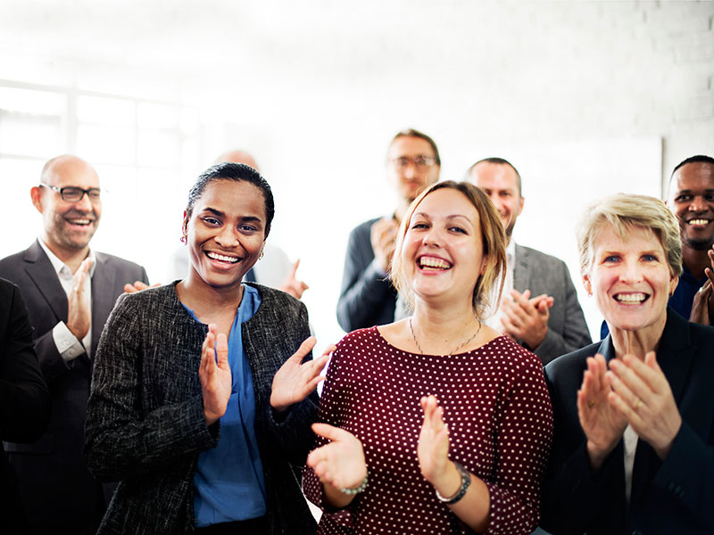 Business People Team Applauding Achievement Concept