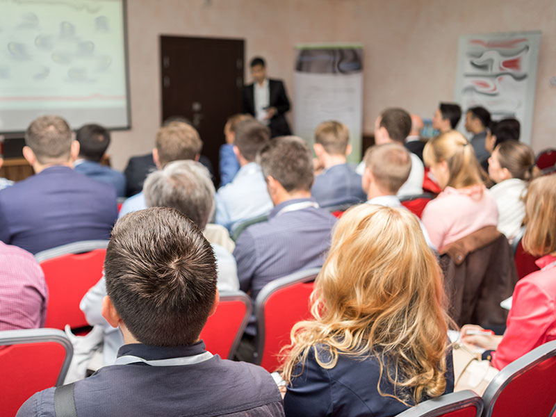 The audience listens to the acting in a conference hall. Seminar, Classroom, Adult.