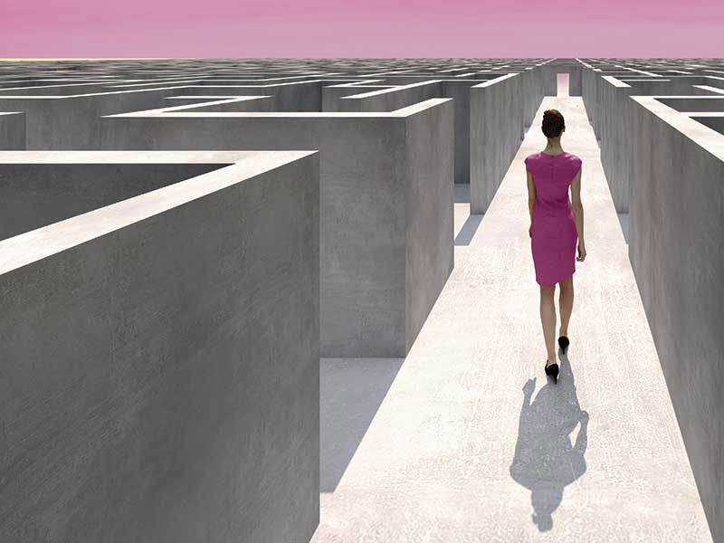 woman in a maze with a clear path