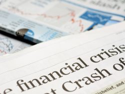 Close up of newspaper headline for financial crisis news stock photo