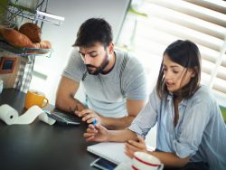 Couple reviewing household debt